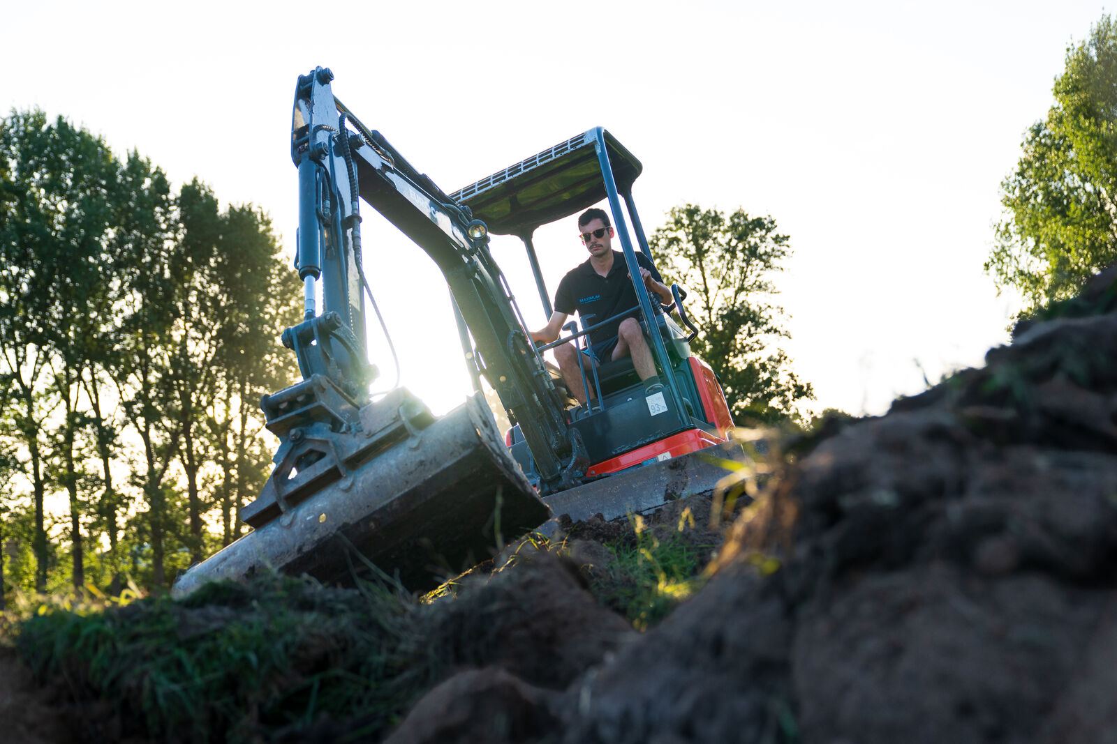 Maximum Earthworks excavator working a Waikato site at golden hour