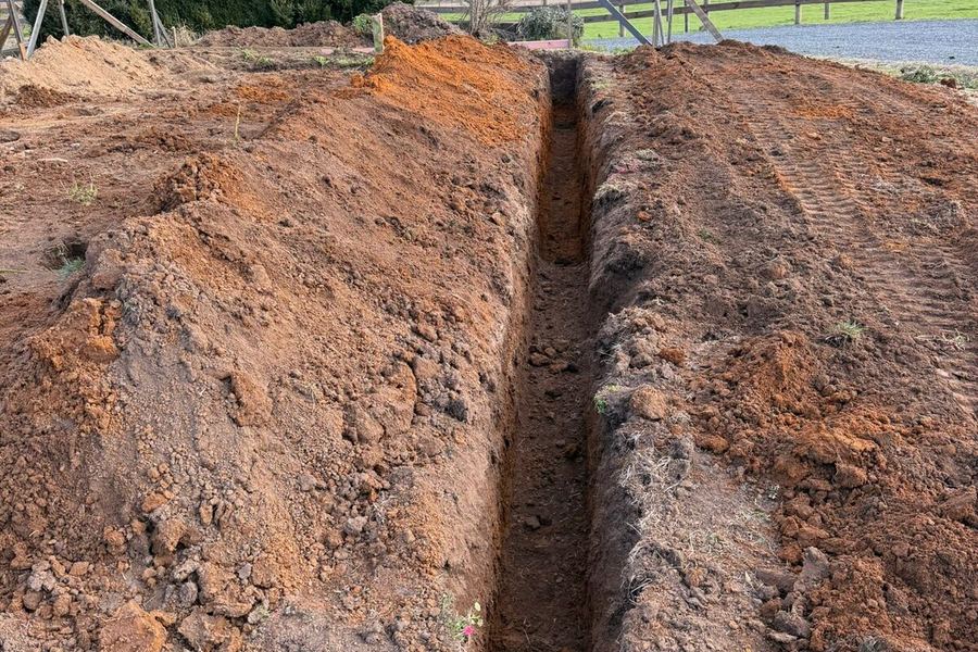 Trenching through Waikato clay