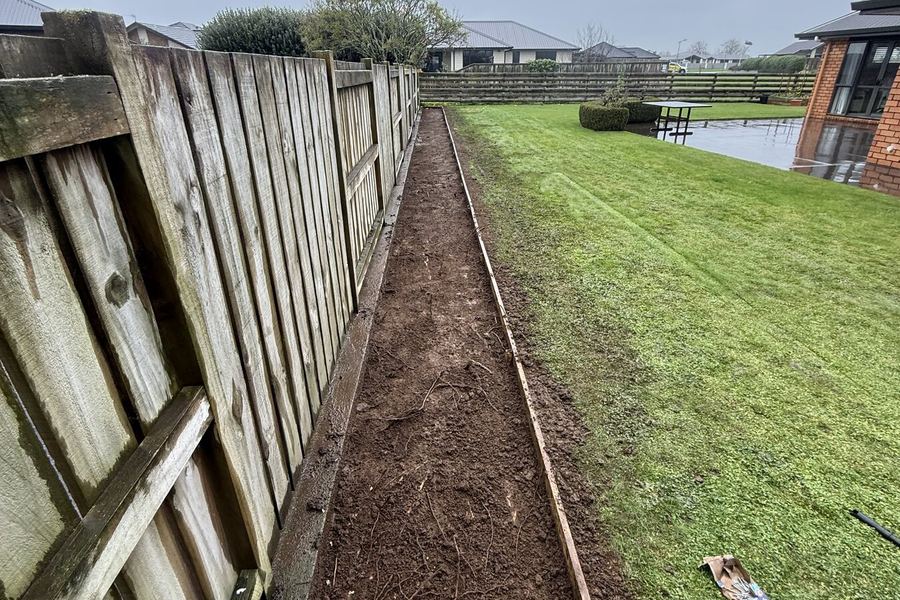 Trench cut along a boundary